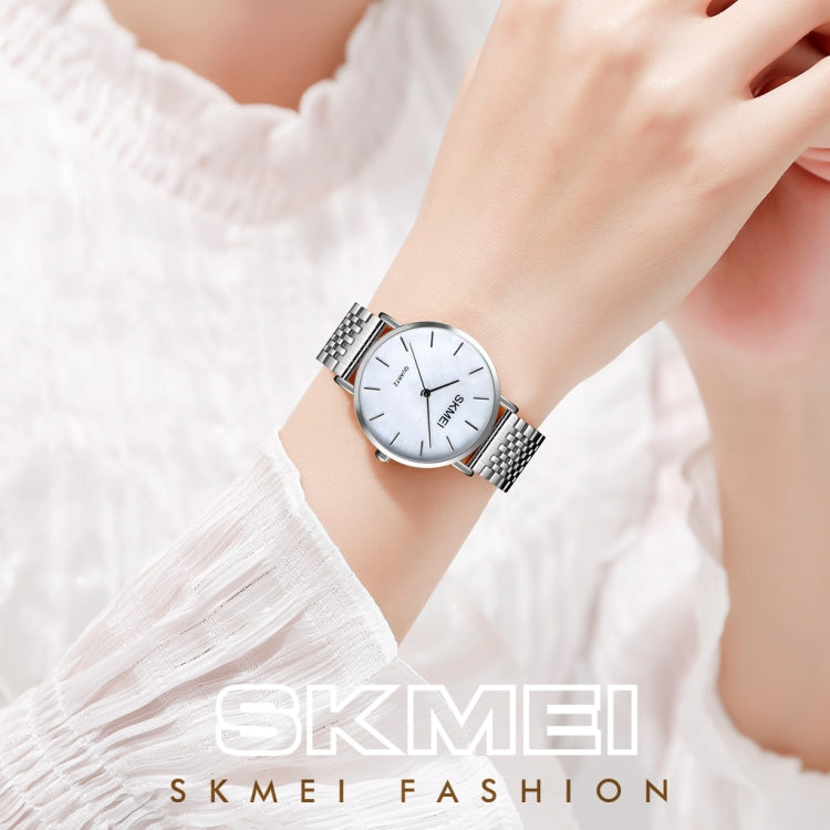 Skmei 1567 Leggero e sottile per il tempo libero Semplice orologio al quarzo da donna con cinturino in acciaio impermeabile da 30 m con quadrante a conchiglia