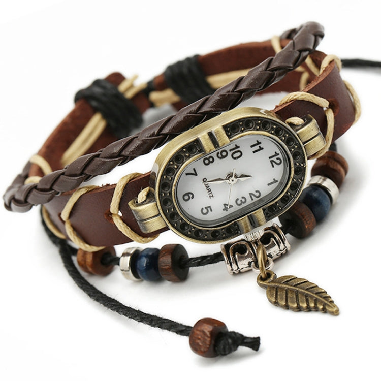 W01350 Orologio vintage con cinturino a foglia in pelle intrecciata