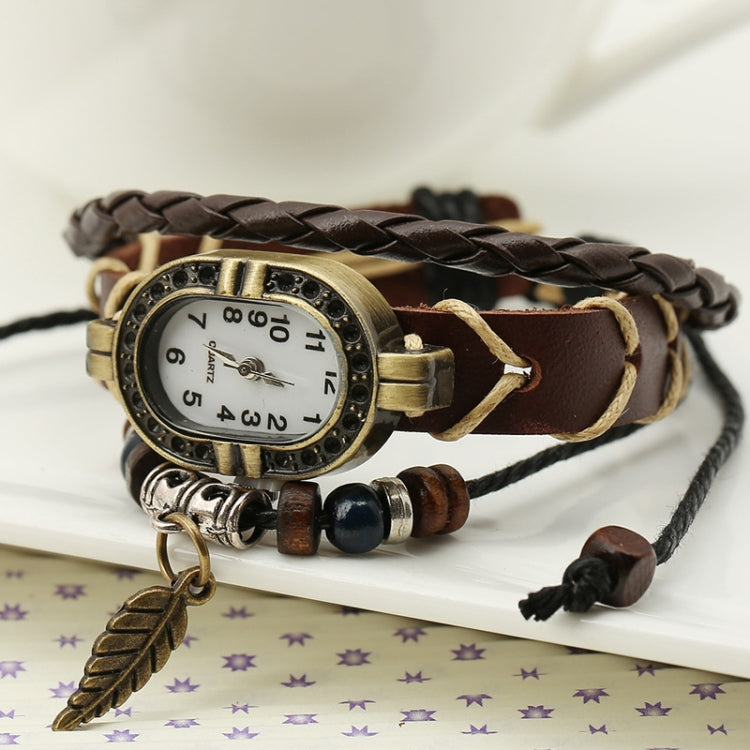 W01350 Orologio vintage con cinturino a foglia in pelle intrecciata